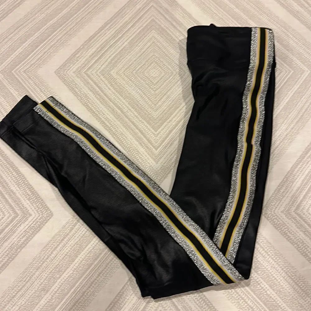 Koral Women’s Trainer High Rise Black with Silver & Yellow Side Stripe Leggings
